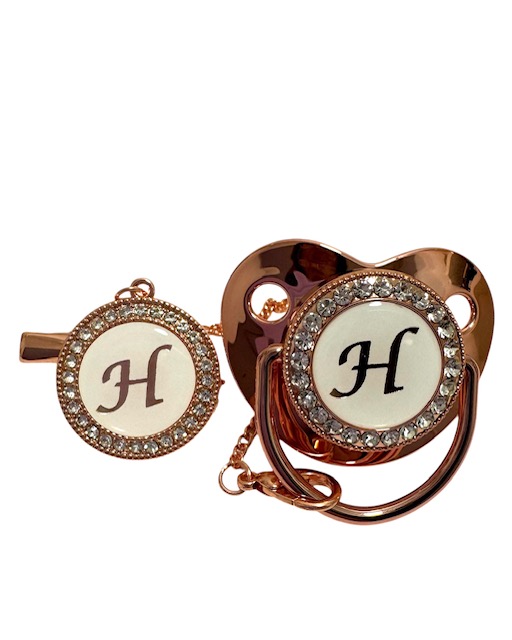 Set de lujo chupete y portachupete Rose gold Set de lujo chupete y portachupete Rose gold